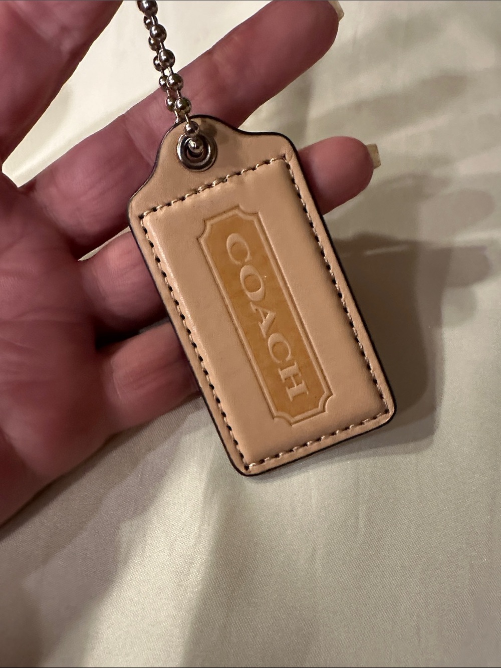Coach Leather Hangtag in Tan and cream